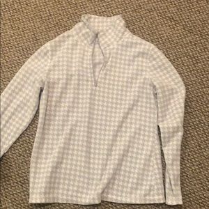 gray and white patterned quarter zip